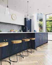 This is a makeover of a dated, oak dining hutch using annie sloan chalk paint in paris grey. Navy Marble And Brass Kitchen Decor Blue Kitchen Decor Kitchen Remodel Brass Kitchen
