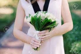Maybe you would like to learn more about one of these? Beautiful Lily Of The Valley Wedding Bouquet In Hands Of The Stock Photo Picture And Royalty Free Image Image 82454916
