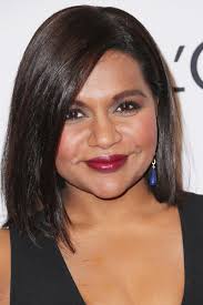 Updo with sweeping side bangs. Mindy Kaling The Most Flattering Haircuts For Women In Their 30s Stylebistro
