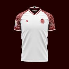 Tonal diagonal lines appear within the red stripes. Wydad Athletic Club Macron Away Prediction Kit 2021