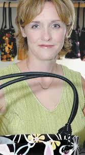 Purse creator grabs family time amid busy business days