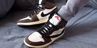Black And Brown Air Jordans Here S An On Foot Look At Travis Scott S Air Jordan 1 Cactus Jack Travis Scott Shoes Air Jordans Jordan Retro 1