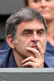 Snooker legend Ronnie O'Sullivan is joined by his lookalike daughter Lilly  in the Royal Box to watch the action