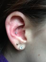 The other is the inner conch, wherein you will get the inner middle part of your ear cartilage pierced. Dual Lobe And Inner Conch Piercing Picture