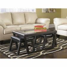Our locally owned and operated stores are passionate about being the best and most affordable furniture store for your home. Ashley Furniture Kelton Coffee Table With 2 Stools In Espresso 24052120868 Ebay