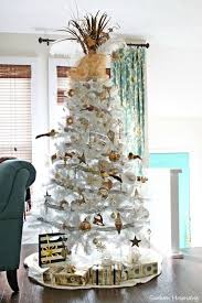 Your christmas tree is the centerpiece of all of your holiday decor, so transform it into a masterpiece. Gold And Silver Christmas Tree Ideas Refresh Restyle