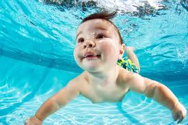 Before Learning To Crawl You Must Learn To Swim Photographing Babies Learn To Swim Baby Swimming