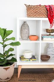 I Love This Ikea Hack It Has A Really Fun Mid Century Modern Feel The Whole Base Is Diyed Awesome Ikea Hack Living Room Ikea Kallax Shelf Home Decor