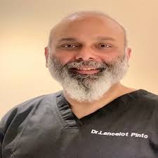Dr. Lancelot Mark Pinto
