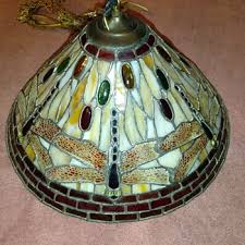 Handel lamp company was known for very high quality and artistic painted shade, metal overlay shades and panel glass lamps and chandeliers. Antique Tiffany Style Lamps Collectors Weekly