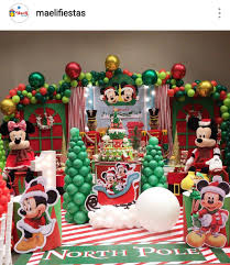 Mickey And Minnie Mouse Christmas Village Dessert Table And Decor Birt Mickeys Christmas Party Mickey Mouse Party Decorations Mickey Mouse Birthday Decorations