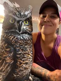 Owl carving for garden pest control