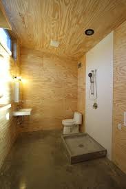 Then i would remove any loose tiles and scrap away any adhesive that is left on the ply and tile, you want the ply and tile to be perfectly clean for the next stage. Plywood Walls Ceiling In Bathroom Advice