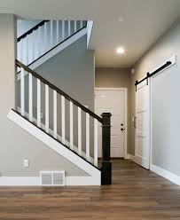 Left the original oak newels in place for strength & boxed around them with the new poplar & added in the new sections. Style Upgrade Fitts Industries Inc Manufacturers Of Quality Stair Parts