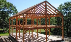 We just can't get any more direct than having vertical posts that hold up horizontal beams, all made of wood. Post Beam Construction Building Wood House Plans 46889