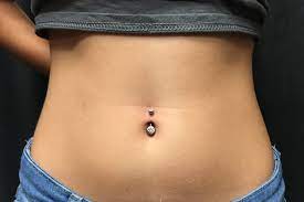 Hip On Belly Button Piercing