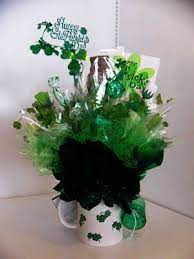 Get ready to party with a huge mixed assortment of delicious candy! How To Make A St Patricks Day Candy Bouquet Candy Bouquet St Patrick S Day Crafts St Patrick Day Treats