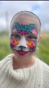 Shimmer and Sparkle Face Painting by Amy