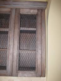 Rustic Farm Cabinet With Chicken Wire Chicken Wire Cabinets Redo Kitchen Cabinets Wood Cabinet Doors