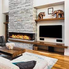 Not too bad considering what they typically cost brand new, and installing a gas fireplace was not in the budget. E72 3 Sided Electric Fireplace Modern Fireplace Ideas Living Rooms Modern Fireplace Home Fireplace