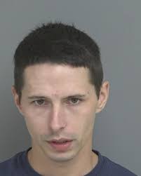 Former Dubuque Police Officer Arrested On Multiple Charges Violating  No-Contact Order