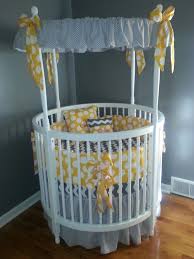 Modern White Round Baby Crib With Amazing Gray Themed Canopy Accessories Also White Circle Pattern Yellow Pillows O Round Baby Cribs Baby Bed Baby Bedding Sets