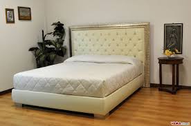 The morocco contemporary bed is nothing short of plush, high end elegance. Bed Upholstered In Leather And Buttoned Details With Frame