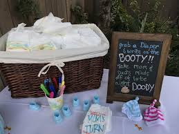 Baby Shower Games Diaper Decoration Station Need Basket For Diapers Markers Or Puffy Paint To De Baby Shower Games Baby Shower Baby Shower Photo Booth Props