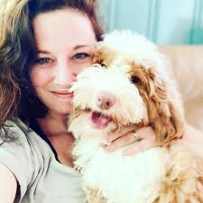 This is our lovely dog Violet. The vet is not sure if she is albino or  double merle. She was born with no pigment but now has some colouring