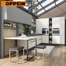 In some apartments extended section of the kitchen is used as the. China Oppein Fitted Kitchen Units Custom Kitchen Cabinets With Dining Table China Custom Kitchen Cabinet Kitchen Units