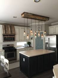 Placing your pendants off center of the island will create an imbalance which the human eye finds distracting. Lauritzen Home Projects Mason Jar Light And Faux Oven Hood Pallet Wood Home Decor Kitchen Home Kitchens Kitchen Remodel