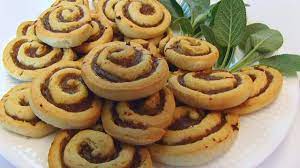 Add sausage on top of parchment paper, making sure none of the sausages are touching. Betty S Sausage Pinwheels Youtube