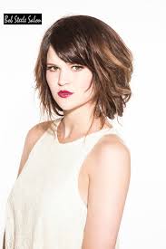 Dark brown hair with subtle auburn highlights keeps it somewhat tame. Short Haircut Styles For Thick Hair Folade