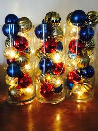 Clear glass vase christmas decoration ideas. Create A Dramatic Glowing Holiday Centerpiece With A Glass Cylinder Vase Round Ornaments And Christmas Vases Holiday Centerpieces Easy Christmas Decorations