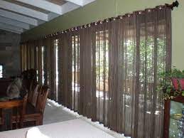 Burlap has a rustic charm and also blocks quite a bit of light from entering the home. Keep The Heat And Light Out With Drapes For Sliding Glass Doors Drapery Room Id Sliding Glass Door Sliding Glass Door Curtains Sliding Door Window Treatments