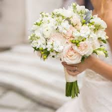 This delicate summer wedding inspiration board was inspired by one of pantone's top 10 colors for spring and summer. Pale Pink And White Bridal Bouquet Bridal Bouquet Summer Wedding Bridal Bouquets Tropical Wedding Flowers