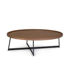 Lift top mechanism provides an elevated surface. Carlyle Coffee Table