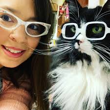 Truffles the Kitty wears glasses to help kids feel confident in them, too