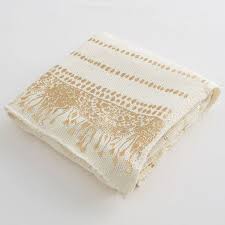 The cable throw blankets are a classic traditional style of knitted blankets. Lilly Pulitzer Gold Printed Knit Throw Blanket Pottery Barn Teen