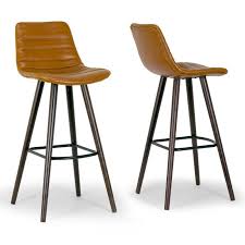 Modern Bar Stool Upholstered With Caramel Brown Colored Faux Leather Decorative Stitching On The Seat And Back A Brown Bar Stools Bar Stools Modern Bar Stools