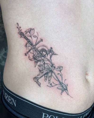 Cherub with dagger in fine line with flowers by @richierichtattoos #cherubtattoo #angeltattoo #finelinecherubtattoo #finelinetattoo #tattoo #stomachtattoo #delicatetattoo #beightontattooartist #brightontattoo #brightontattooshop #brighton ...