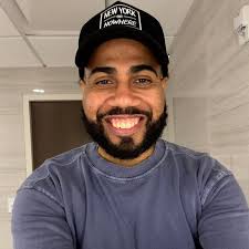 The barista waiting for me to give her a 125% tip for microwaving a  sandwich.