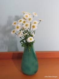 We did not find results for: Tall Green Blown Glass Vase Ii Lilley Glass Designs