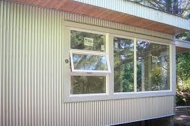 I have 2 pole barns to side with vertical corrugated metal and have to install roughly 10 windows. Corrugated Steel Siding Photos