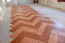 Cork flooring is a cheaper alternative to hardwood. Installing Cork Tile Flooring In The Kitchen Cork Flooring Diy Herringbone Floor Flooring