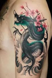09.05.2020 · the dragon tattoo sleeve. 25 Amazing Dragon Tattoo Designs For Men And Women With Images