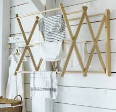 I needed to raise the washer and dryer so i don't have to bend over as much to load and unload. Domestic Science A New Limited Edition Collection Of Household Wares From Ikea Remodelista Wall Drying Rack Ikea Drying Rack
