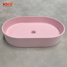 The solid acrylic surface is easy to clean and scratch resistant. China Pink Solid Surface Bathroom Table Top Small Stone Basin China Small Stone Basin Table Top Basin