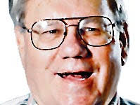 Truman grad takes over Belton football