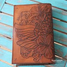 Flower medley pattern for leather carving. Leather Tooled Book Cover With Koi And Hibiscus